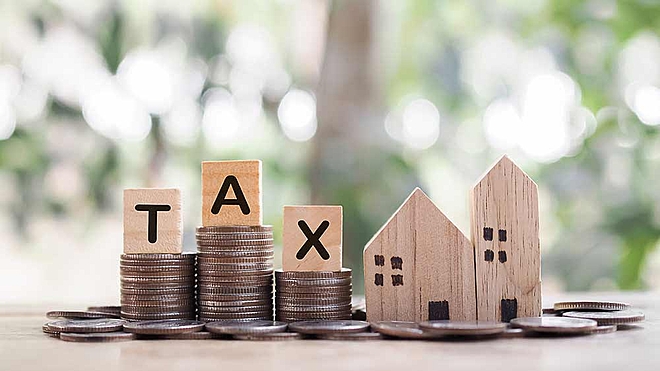 Property owners now have two capital gains tax options: old (20 per cent tax with indexation) and new (12.5 per cent tax)