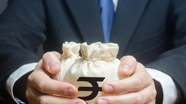 Where should an NRI invest Rs 1.5 lakh monthly in the long term?