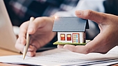 What factors should I consider while buying a second home?