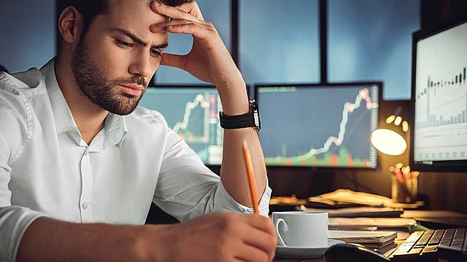 Should an NRI invest his surplus money in Indian mutual funds or use it to repay a loan? Here's some help.